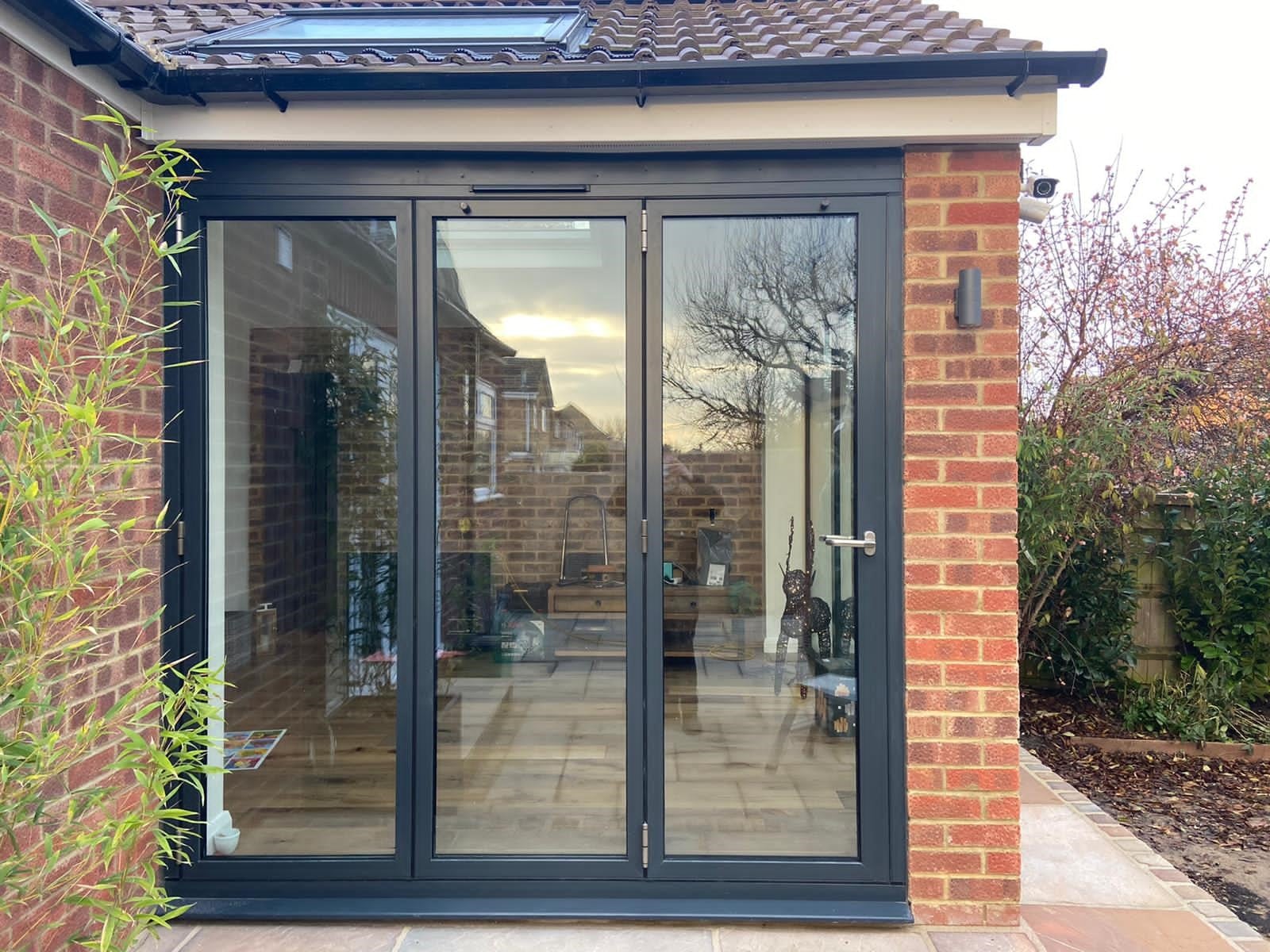 black orangery with bifold door